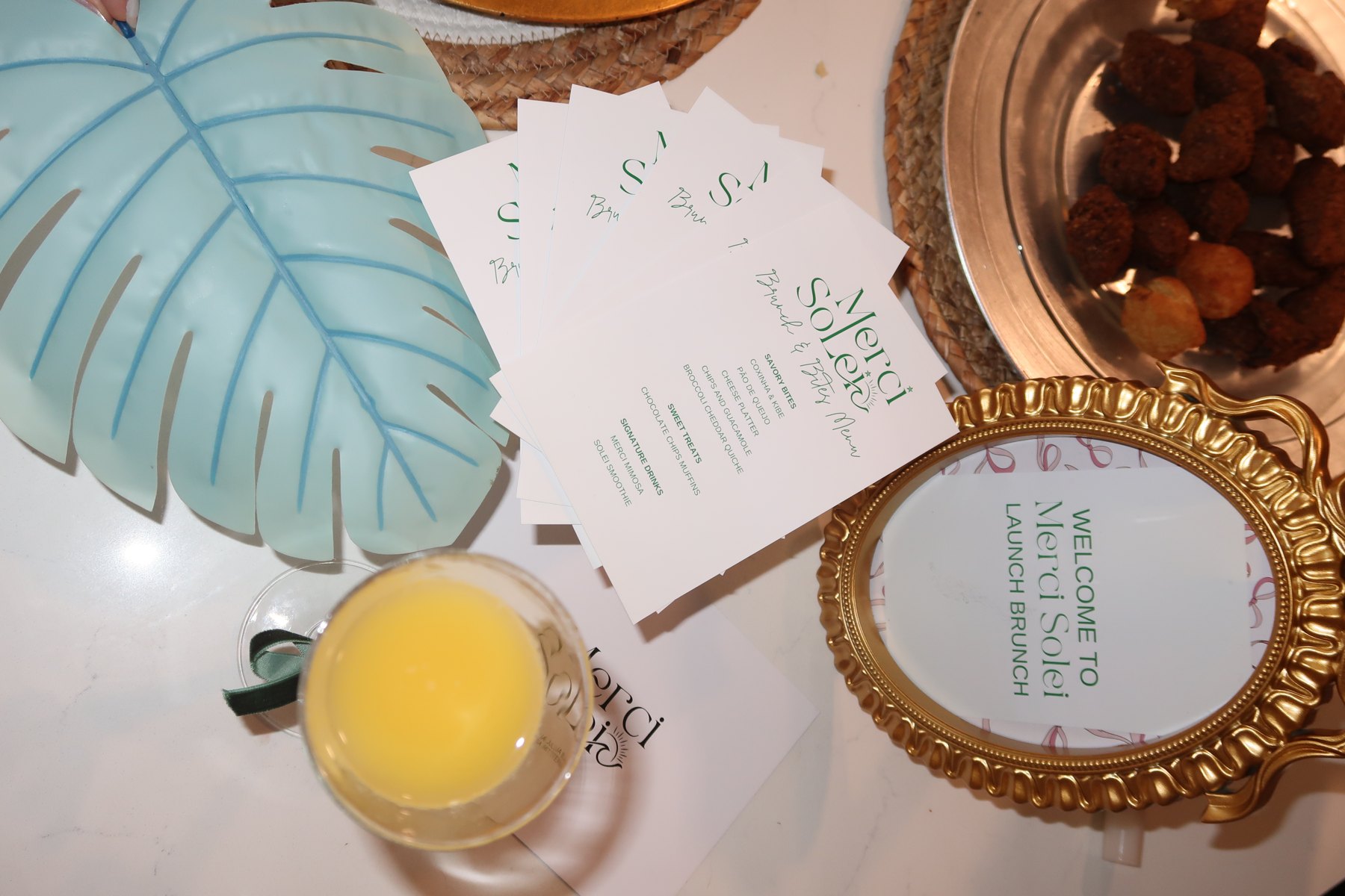 Merci Solei · Printed details, drinks and a shared table