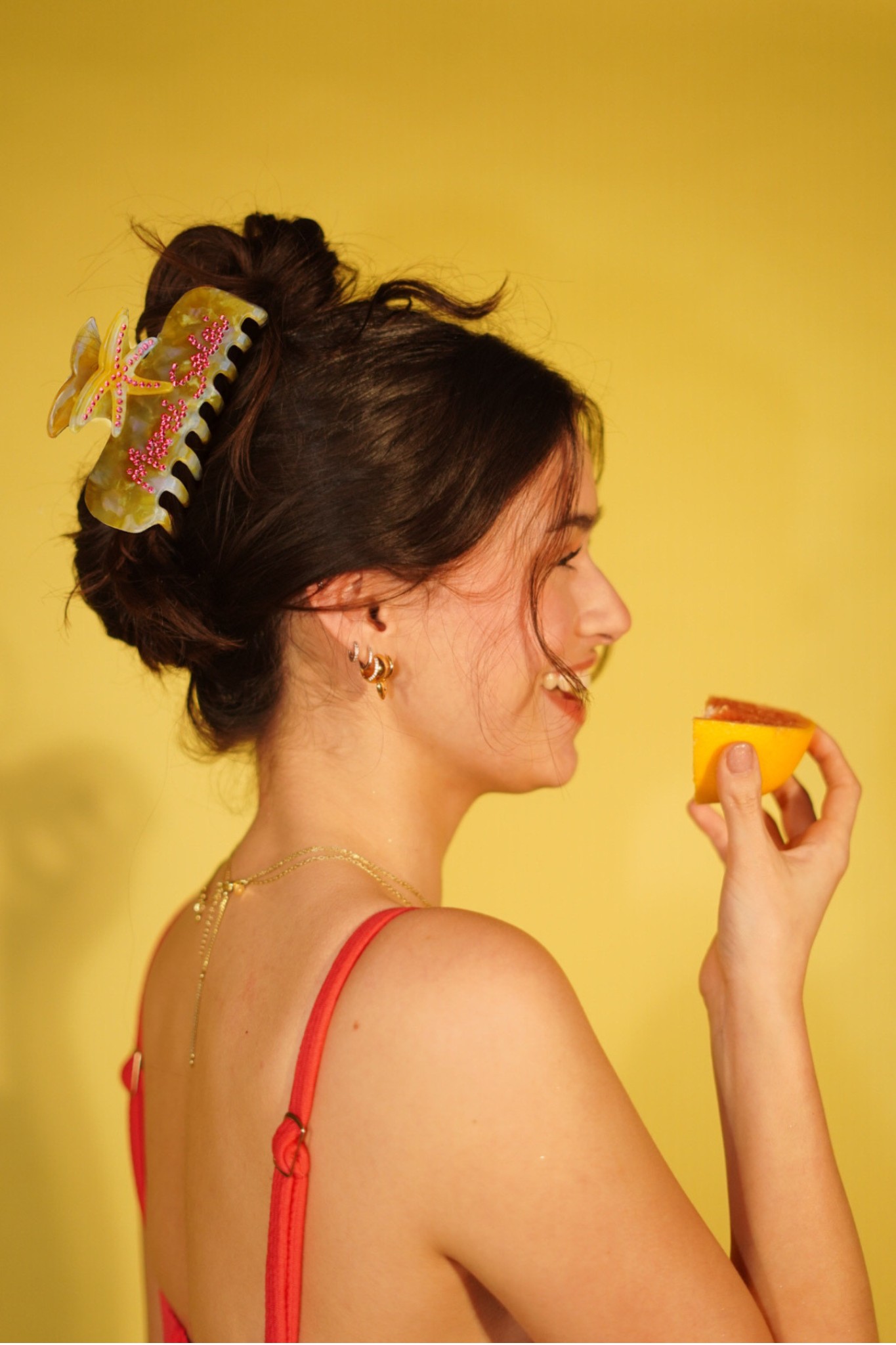Profile showing the Solei Clip styled in the hair